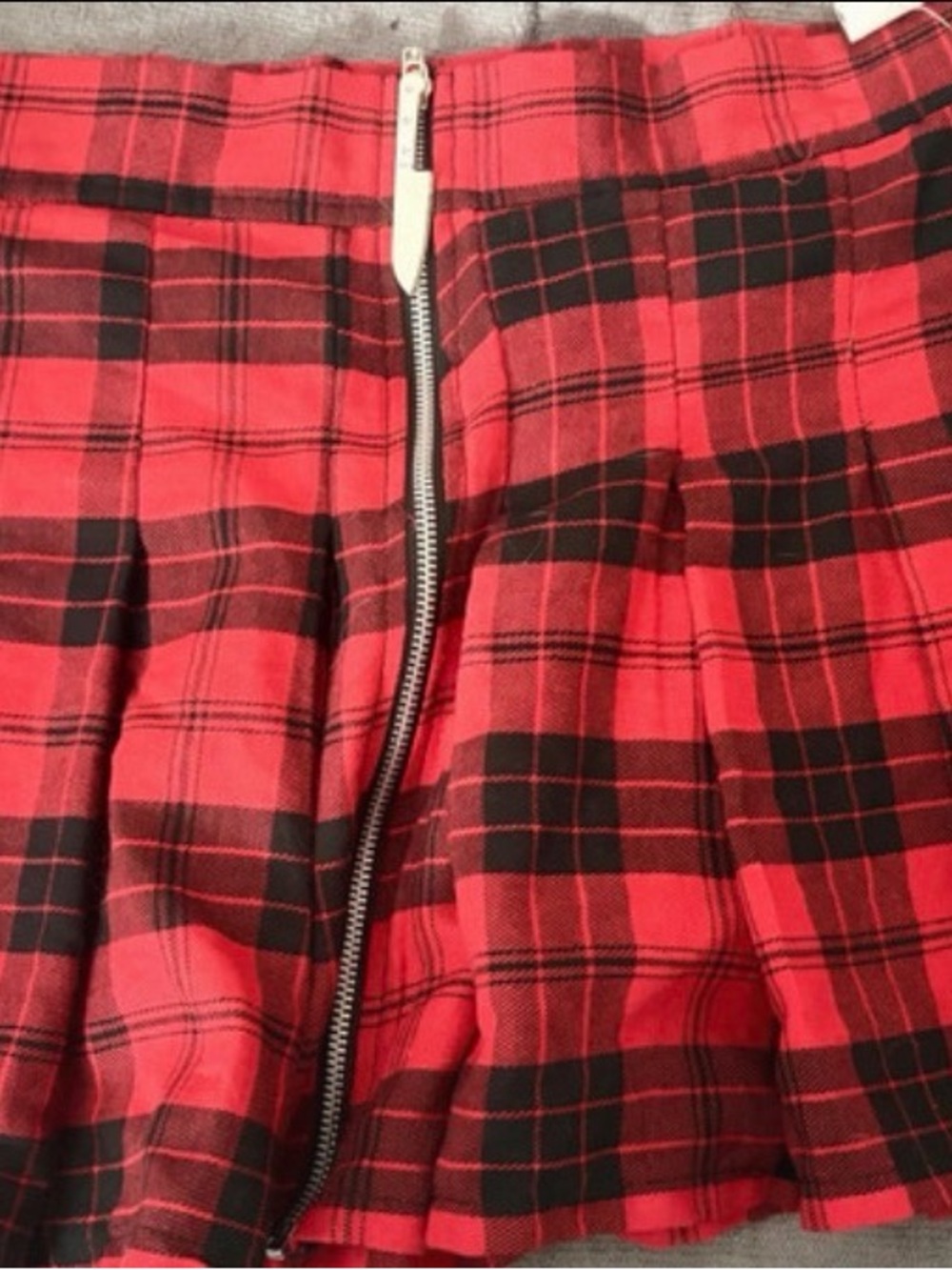 Spencer's Red and Black Plaid Zip-Front Pleated Mini Skirt